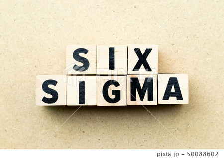 Letter block in word six sigma on wood background Letter block in word six sigma on wood background 50088602