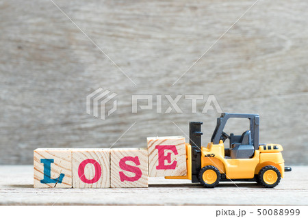 Toy forklift hold letter block e to word lose Toy forklift hold letter block e to word lose 50088999