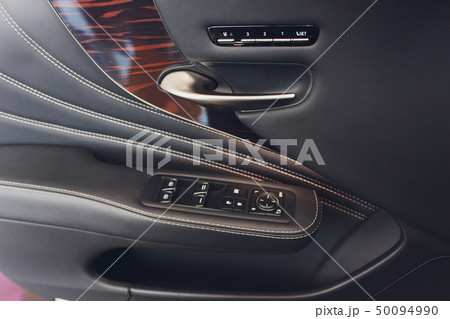 Car inside. Interior of prestige modern car. Climate control, hi-end sound speakers, seat memory 50094990