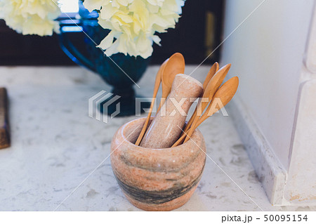Wooden rustic and vintage crockery, tableware, utensils and stuff on wooden table-top. Kitchen still Wooden rustic and vintage crockery, tableware, utensils and stuff on wooden table-top. Kitchen still 50095154