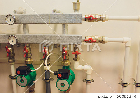 Hot water boiler. Boiler room with a heating system. Hot water boiler. Boiler room with a heating system. 50095344