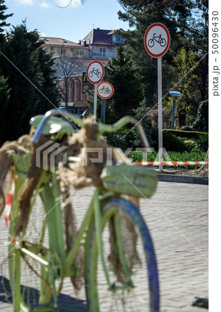 Bicycle and three road signs "closed to bicycles" Bicycle and three road signs "closed to bicycles" 50096430