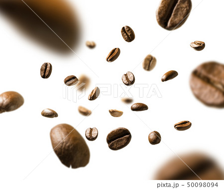 Coffee beans in flight on white background Coffee beans in flight on white background 50098094