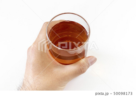 ガラスのコップに入れたお茶の写真素材