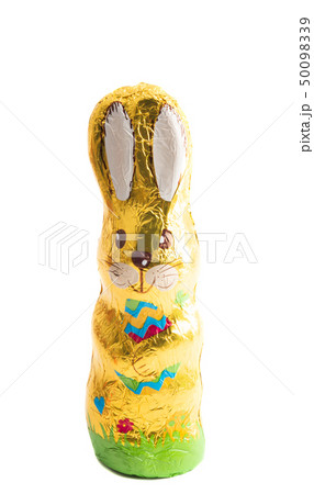 chocolate bunny in foil isolated 50098339