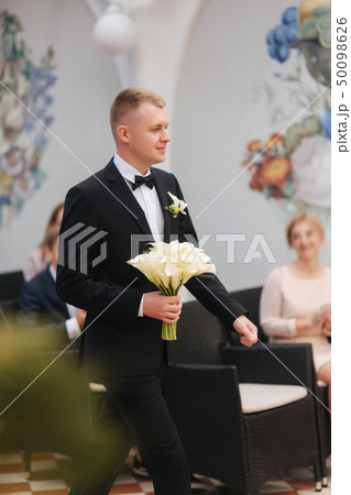 Groom go to bride on wedding ceremony 50098626