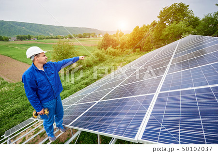 Installing of solar photo voltaic panel system Installing of solar photo voltaic panel system 50102037