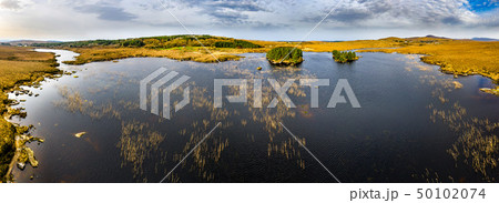 Aerial view of Loch Mhin Leic na Leabhar - Meenlecknalore Lough - close to Dungloe in County Donegal Aerial view of Loch Mhin Leic na Leabhar - Meenlecknalore Lough - close to Dungloe in County Donegal 50102074