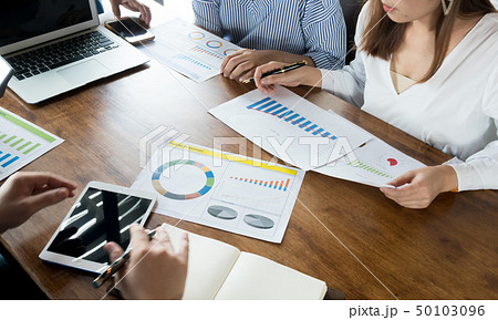 people working on computer marketing online search 50103096