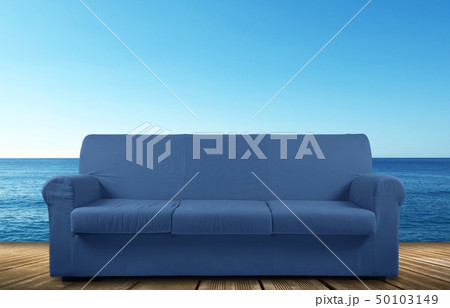 Blue sofa in the beach holiday background Blue sofa in the beach holiday background 50103149