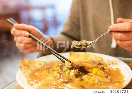 at traditional Taiwanese snack of oyster omelet 50105721
