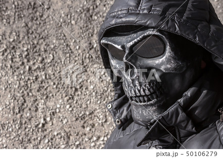 Thug in a black mask and jacket Thug in a black mask and jacket 50106279