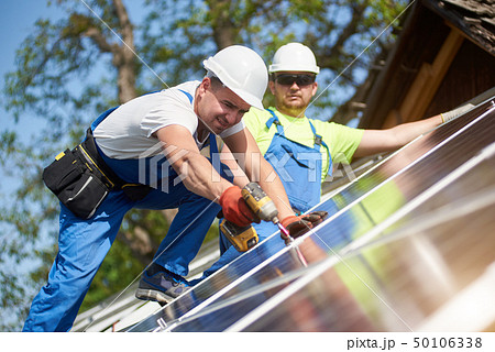 Stand-alone exterior solar panel system installation, renewable green energy generation concept. Stand-alone exterior solar panel system installation, renewable green energy generation concept. 50106338