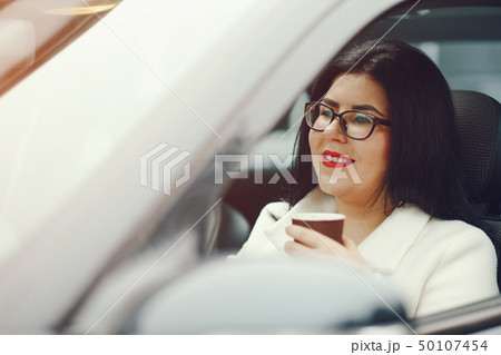 woman in a car woman in a car 50107454