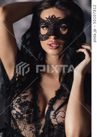 portrait of sexy beautiful woman in lace lingerie and carnival mask portrait of sexy beautiful woman in lace lingerie and carnival mask 50107812