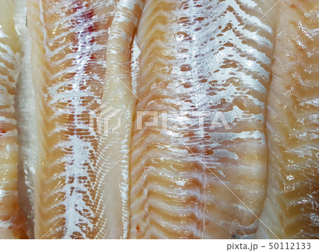 Appetizing raw fish steaks 50112133