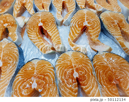 Appetizing raw fish steaks 50112134