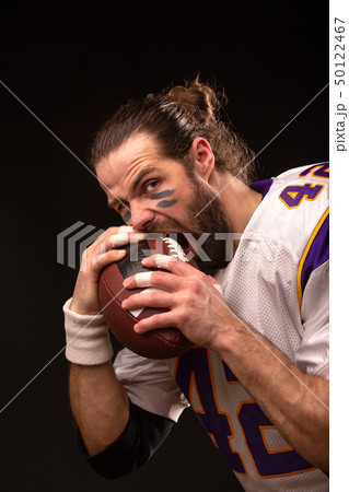 Close up portrait of aggressive American Football Player Close up portrait of aggressive American Football Player 50122467