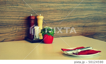 Beautiful wooden table in restaurant or home. Beautiful wooden table in restaurant or home. 50124590