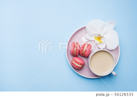 Concept morning Breakfast. Cup of coffee macaroon Concept morning Breakfast. Cup of coffee macaroon 50126535