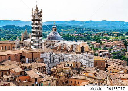 Aerial view of Siena Cathedral and the cityscape o Aerial view of Siena Cathedral and the cityscape o 50133757