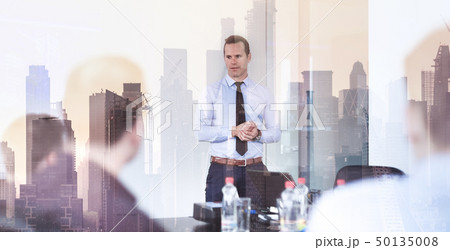 Confident company leader on business meeting against new york city manhattan buildings and Confident company leader on business meeting against new york city manhattan buildings and 50135008