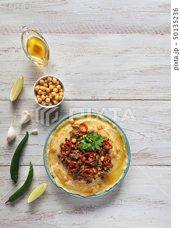 Creamy hummus with spicy mutton minced meat. Creamy hummus with spicy mutton minced meat. 50135236