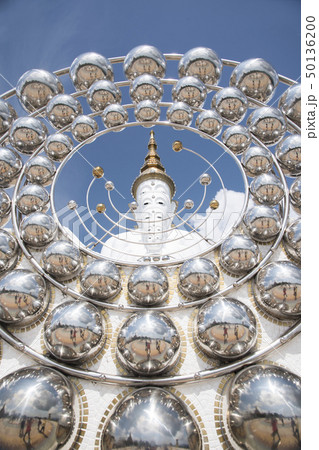 Buddha white in Thailand on blue sky background 50136200