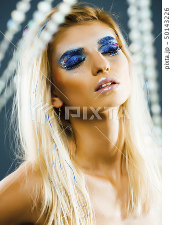 bright blond young woman with fashion style makeup posing sensual bright blond young woman with fashion style makeup posing sensual 50143226