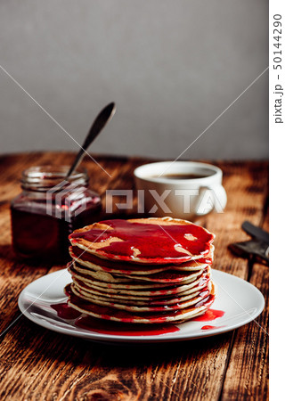 Stack of pancakes with berry jam Stack of pancakes with berry jam 50144290