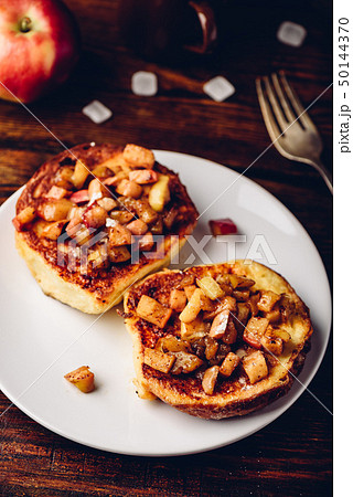 French toasts with apple and cinnamon French toasts with apple and cinnamon 50144370