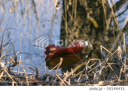 Water pollution, empty plastic bottles. 50146431