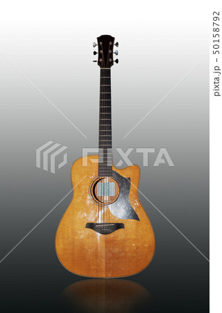 Split wooden guitar on a white background 50158792