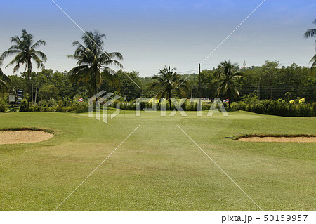 The evening golf course has sunlight in Thailand 50159957