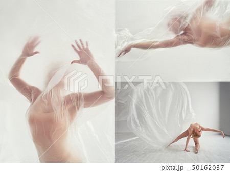 Gymnast in body tights.Behind the clear matte film. Plastic body, airiness , weightlessness and Gymnast in body tights.Behind the clear matte film. Plastic body, airiness , weightlessness and 50162037