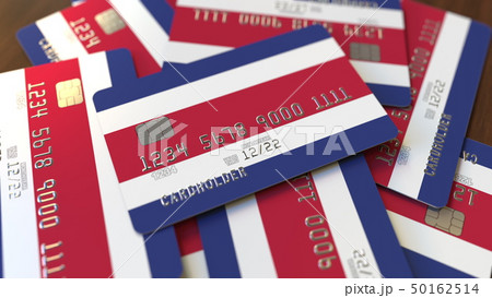Pile of credit cards with flag of Costa Rica. Banking system conceptual 3D rendering Pile of credit cards with flag of Costa Rica. Banking system conceptual 3D rendering 50162514