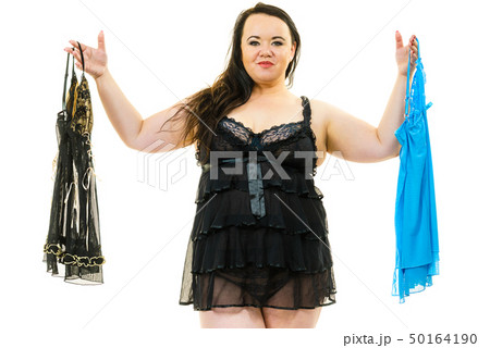 Plus size woman fitting satin nightwear Plus size woman fitting satin nightwear 50164190