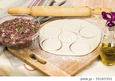 fresh raw dough and beef forcemeat fresh raw dough and beef forcemeat 50165501