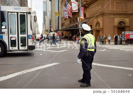 NYPD traffic control officer on the streets of NY 50168649