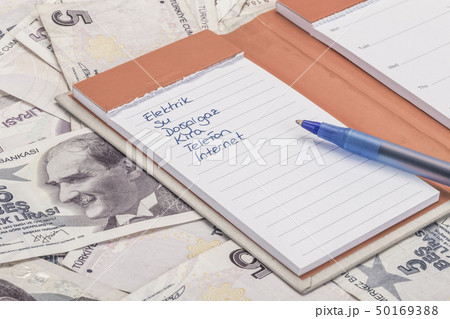 Monthly expenses list on Turkish lira banknotes Monthly expenses list on Turkish lira banknotes 50169388