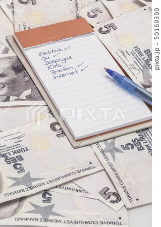 Monthly expenses list on Turkish lira banknotes Monthly expenses list on Turkish lira banknotes 50169390
