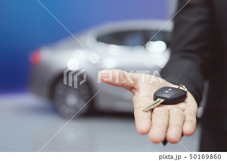Business man hand holding car keys  50169860