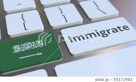 IMMIGRATE text and flag of Saudi Arabia on the buttons on the computer keyboard. Conceptual 3D 50172982