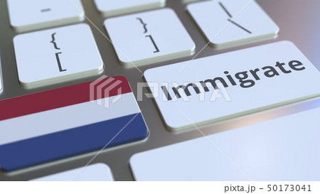 IMMIGRATE text and flag of the Netherlands on the buttons on the computer keyboard. Conceptual 3D 50173041