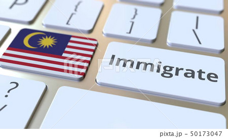 IMMIGRATE text and flag of Malaysia on the buttons on the computer keyboard. Conceptual 3D rendering 50173047