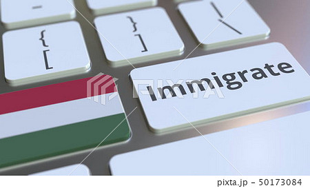 IMMIGRATE text and flag of Hungary on the buttons on the computer keyboard. Conceptual 3D rendering 50173084