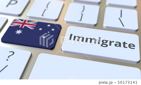 IMMIGRATE text and flag of Australia on the buttons on the computer keyboard. Conceptual 3D 50173141