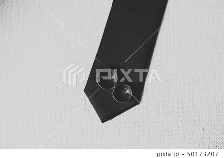 Two golden wedding rings isolated background concept 50173207