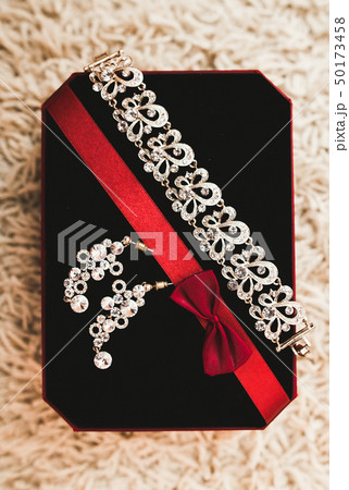 Luxury wedding jewelry for bride. Preparing in the morning Luxury wedding jewelry for bride. Preparing in the morning 50173458