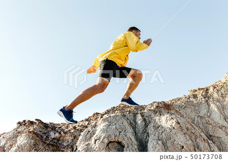man climb uphill mountain 50173708